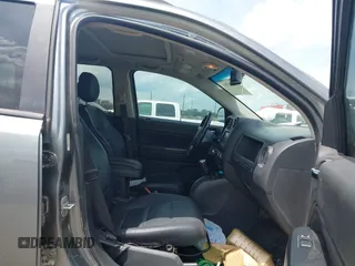 2011 Jeep Compass Latitude with VIN 1J4NT1FB4BD246549, listed as a IAAI auction lot 42156761 with 232,739 mi miles. Bid and sale history available at carsss.com. Image 5.