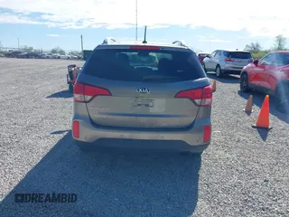 2015 Kia Sorento LX with VIN 5XYKTCA63FG654739, listed as a IAAI auction lot 42081544 with 121,024 mi miles. Bid and sale history available at carsss.com. Image 16.