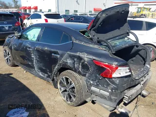 2016 Nissan Maxima SV with VIN 1N4AA6AP4GC378580, listed as a IAAI auction lot 41671281 with 122,866 mi miles and . Bid and sale history available at DreamBid. Image 3.
