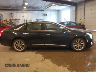 2014 Cadillac XTS Luxury with VIN 2G61M5S39E9325923, listed as a IAAI auction lot 41253343 with 69,319 mi miles. Bid and sale history available at carsss.com. Image 13.