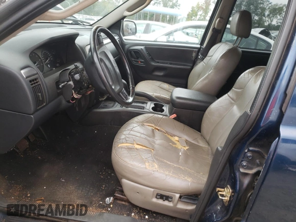 2002 Jeep Grand Cherokee z VIN 1J4GX38S42C229150, wystawiony jako Copart lot #72586834 z przebiegiem 201 103 mil mil oraz Szkoda całkowita • Salvage title. Historia ofert i sprzedaży dostępna na DreamBid. Obrazek 7.