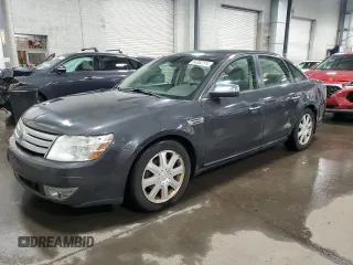 2008 Ford Taurus Limited with VIN 1FAHP25W38G159742, listed as a Copart auction lot 84382114 with 167,233 mi miles and Salvage Title. Bid and sale history available at carsss.com. Image 1.