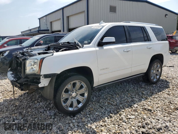 2016 GMC Yukon Denali with VIN 1GKS1CKJ3GR403865, listed as a Copart auction lot 68534264 with 129,655 mi miles and Salvage Title. Bid and sale history available at carsss.com. Image 1.