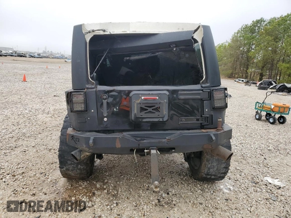 2012 Jeep Wrangler Unlimited Rubicon with VIN 1C4HJWFG7CL205244, listed as a Copart auction lot 86651914 with Not provided miles and Salvage title. Bid and sale history available at DreamBid. Image 6.