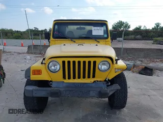 2002 Jeep Wrangler X z VIN 1J4FA39S82P719241, wystawiony jako IAAI lot #42150742 z przebiegiem 147 914 mil mil oraz . Historia ofert i sprzedaży dostępna na DreamBid. Obrazek 12.