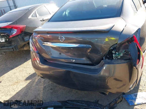 2013 Nissan Maxima S z VIN 1N4AA5AP7DC813288, wystawiony jako IAAI lot #41729598 z przebiegiem 133 573 mil mil oraz . Historia ofert i sprzedaży dostępna na DreamBid. Obrazek 16.