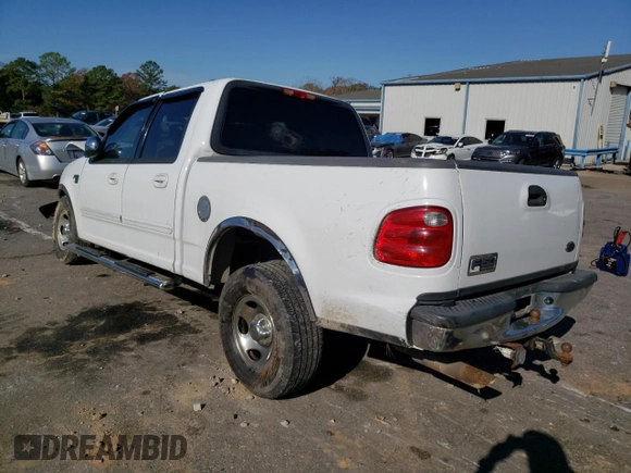 2002 Ford F-150 XLT with VIN 1FTRW07L42KB90527, listed as a Copart auction lot 85098244 with 143,213 mi miles and Salvage Title. Bid and sale history available at carsss.com. Image 2.