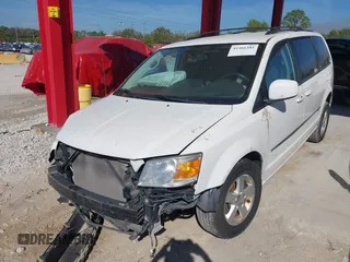 2010 Dodge Grand Caravan SXT with VIN 2D4RN5D1XAR462150, listed as a IAAI auction lot 41466381 with 204,531 mi miles and . Bid and sale history available at DreamBid. Image 2.