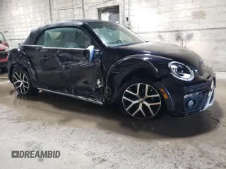 2017 Volkswagen Beetle with VIN 3VWT17AT2HM816046, listed as a Copart auction lot 77377274 with 27,948 mi miles and Salvage Title. Bid and sale history available at DreamBid. Image 4.