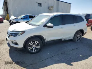 2018 Honda Pilot EX-L with VIN 5FNYF6H62JB043352, listed as a Copart auction lot 60728885 with 92,556 mi miles and Salvage title. Bid and sale history available at DreamBid. Image 1.