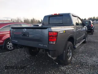 2014 Nissan Titan S with VIN 1N6AA0EC4EN500528, listed as a IAAI auction lot 41323510 with 31,164 mi miles and . Bid and sale history available at DreamBid. Image 4.