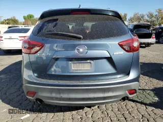 2016 Mazda CX-5 Grand Touring with VIN JM3KE2DY8G0644790, listed as a Copart auction lot 82060424 with 0 mi miles and Clean Title. Bid and sale history available at carsss.com. Image 6.