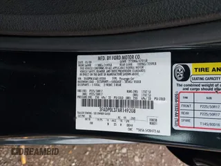 2010 Ford Fusion Hybrid with VIN 3FADP0L37AR149208, listed as a IAAI auction lot 42049333 with 53,910 mi miles. Bid and sale history available at carsss.com. Image 9.