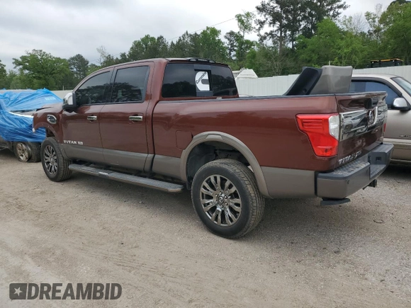 2016 Nissan Titan Platinum Reserve z VIN 1N6BA1F27GN502924, wystawiony jako Copart lot #51345105 z przebiegiem 90 215 mil mil oraz Szkoda całkowita • Salvage title. Historia ofert i sprzedaży dostępna na DreamBid. Obrazek 2.