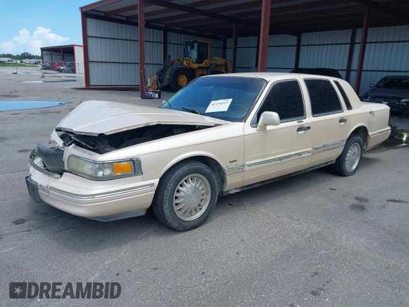 1996 Lincoln Town Car Cartier with VIN 1LNLM83W7TY634343, listed as a IAAI auction lot 42474123 with 193,705 mi miles and . Bid and sale history available at DreamBid. Image 2.