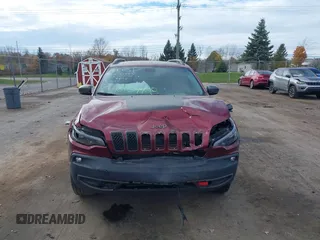 2019 Jeep Cherokee Trailhawk Elite with VIN 1C4PJMBX6KD378848, listed as a IAAI auction lot 40754408 with 52,901 mi miles. Bid and sale history available at carsss.com. Image 11.