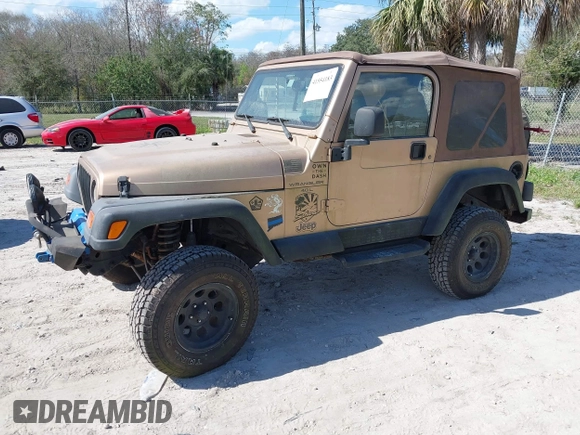 2000 Jeep Wrangler Sahara with VIN 1J4FA59S8YP763468, listed as a IAAI auction lot 41554183 with 182,922 mi miles. Bid and sale history available at carsss.com. Image 2.