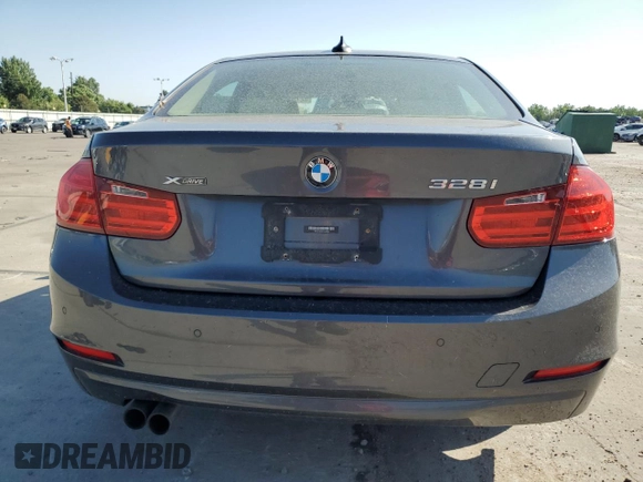 2013 BMW 3 Series 328i xDrive z VIN WBA3B3C5XDF533439, wystawiony jako Copart lot #62130615 z przebiegiem 125 712 mil mil oraz Szkoda całkowita • Salvage title. Historia ofert i sprzedaży dostępna na DreamBid. Obrazek 6.