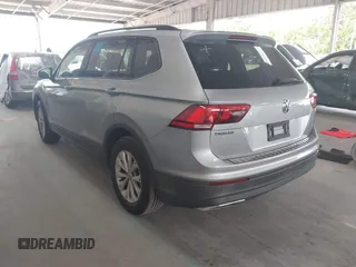 2019 Volkswagen Tiguan S with VIN 3VV1B7AX6KM189497, listed as a IAAI auction lot 42669313 with 236,719 mi miles and . Bid and sale history available at DreamBid. Image 3.