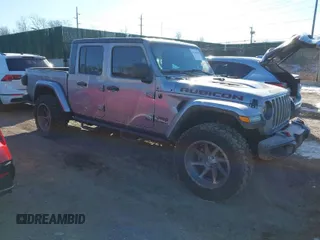 2020 Jeep Gladiator Rubicon with VIN 1C6JJTBG3LL146111, listed as a IAAI auction lot 41549848 with 60,054 mi miles and . Bid and sale history available at DreamBid. Image 1.