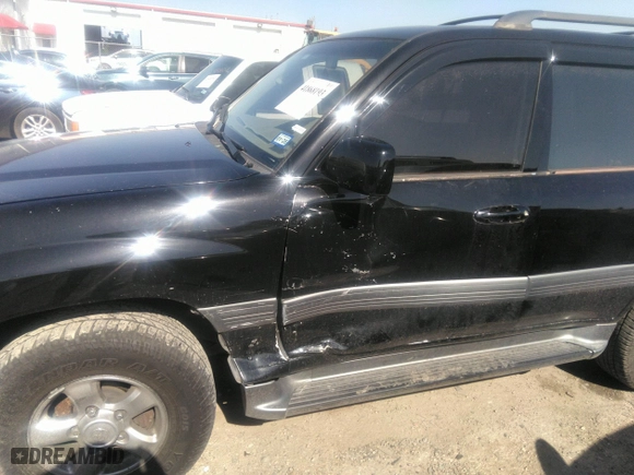 2001 Toyota Land Cruiser with VIN JTEHT05J512016563, listed as a IAAI auction lot 41868193 with 247,653 mi miles. Bid and sale history available at carsss.com. Image 6.