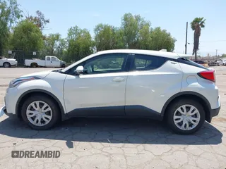 2020 Toyota C-HR LE with VIN JTNKHMBX3L1074882, listed as a IAAI auction lot 42064899 with 44,897 mi miles and . Bid and sale history available at DreamBid. Image 14.
