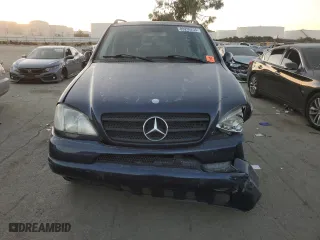2001 Mercedes-Benz M-Class with VIN 4JGAB72E91A260677, listed as a Copart auction lot 89200235 with 180,414 mi miles and Salvage Title. Bid and sale history available at carsss.com. Image 5.