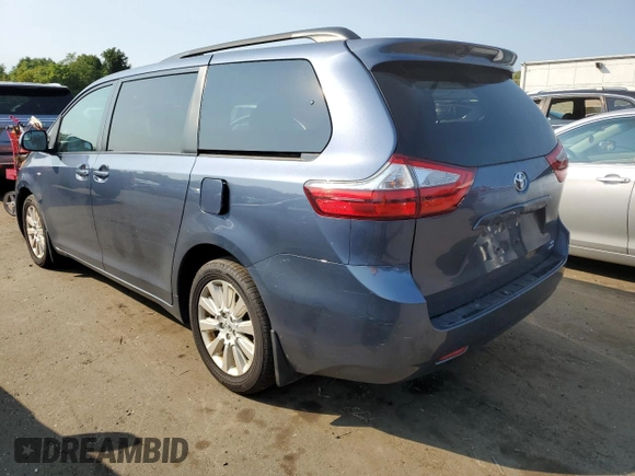 2016 Toyota Sienna LE with VIN 5TDJK3DC2GS133323, listed as a Copart auction lot 70515664 with 106,750 mi miles and Salvage Title. Bid and sale history available at carsss.com. Image 2.