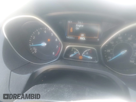 2017 Ford Focus SE z VIN 1FADP3F21HL237412, wystawiony jako IAAI lot #42188886 z przebiegiem 148 355 mil mil oraz . Historia ofert i sprzedaży dostępna na DreamBid. Obrazek 7.