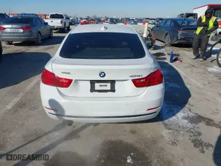 2016 BMW 4 Series 428i with VIN WBA4A9C50GG696366, listed as a IAAI auction lot 41615789 with 103,763 mi miles. Bid and sale history available at carsss.com. Image 16.