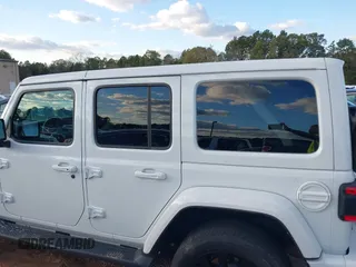 2021 Jeep Wrangler Unlimited Sahara with VIN 1C4JJXP64MW840094, listed as a IAAI auction lot 40830676 with 31,716 mi miles and . Bid and sale history available at DreamBid. Image 15.