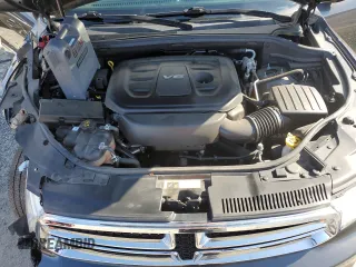 2018 Dodge Durango SXT z VIN 1C4RDJAG4JC489483, wystawiony jako Copart lot #54107105 z przebiegiem 92 676 mil mil oraz Szkoda całkowita • Salvage title. Historia ofert i sprzedaży dostępna na DreamBid. Obrazek 12.