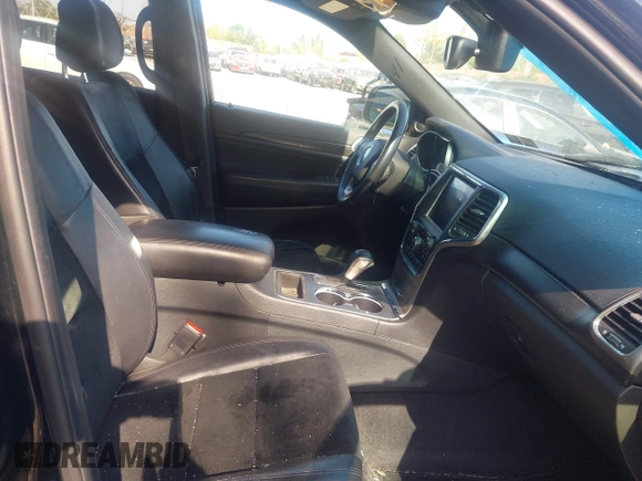 2018 Jeep Grand Cherokee Laredo E with VIN 1C4RJFAG2JC320441, listed as a IAAI auction lot 42095419 with 136,962 mi miles. Bid and sale history available at carsss.com. Image 5.