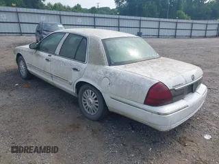 2006 Mercury Grand Marquis LS Premium z VIN 2MEFM75V96X649641, wystawiony jako IAAI lot #42315126 z przebiegiem 144 173 mil mil oraz . Historia ofert i sprzedaży dostępna na DreamBid. Obrazek 3.