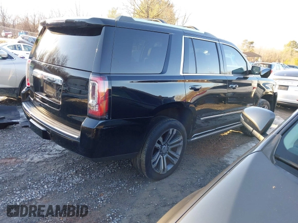 2019 GMC Yukon Denali with VIN 1GKS2CKJ2KR137664, listed as a IAAI auction lot 41335229 with 151,394 mi miles and . Bid and sale history available at DreamBid. Image 4.
