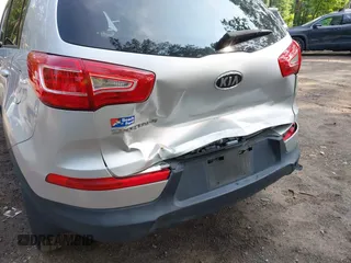 2012 Kia Sportage LX with VIN KNDPB3A2XC7334509, listed as a IAAI auction lot 42441009 with 253,302 mi miles and . Bid and sale history available at DreamBid. Image 6.