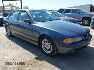 2000 BMW 5 Series 528iA with VIN WBADM6343YGV01651, listed as a IAAI auction lot 41745574 with 143,898 mi miles. Bid and sale history available at carsss.com. Image 1.