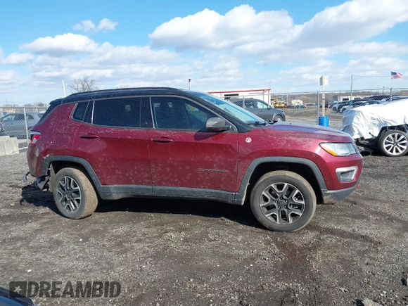 2020 Jeep Compass Trailhawk with VIN 3C4NJDDB2LT239384, listed as a IAAI auction lot 41527372 with 56,122 mi miles and . Bid and sale history available at carsss.com. Image 13.