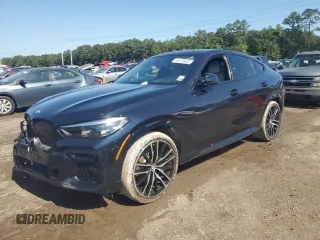 2023 BMW X6 xDrive40i z VIN 5UXCY6C07P9N68903, wystawiony jako Copart lot #56130635 z przebiegiem 46 763 mil mil oraz Szkody całkowita. Historia ofert i sprzedaży dostępna na DreamBid. Obrazek 1.