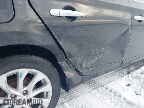 2018 Nissan Sentra S with VIN 3N1AB7AP0JY260332, listed as a IAAI auction lot 41286526 with 149,956 mi miles and . Bid and sale history available at DreamBid. Image 6.