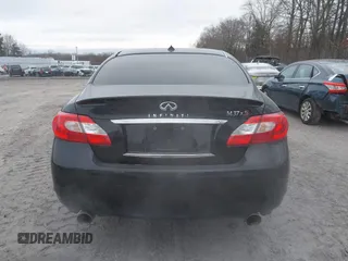 2013 Infiniti M z VIN JN1BY1AR9DM600490, wystawiony jako IAAI lot #41248655 z przebiegiem 125 167 mil mil oraz . Historia ofert i sprzedaży dostępna na DreamBid. Obrazek 16.