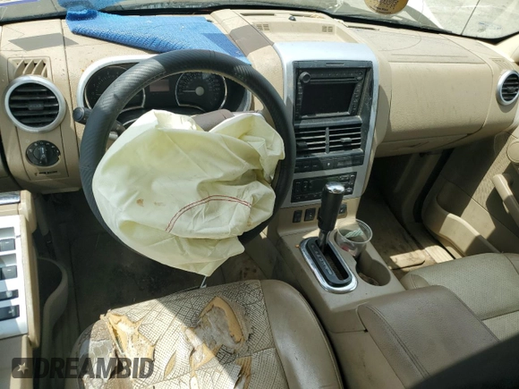 2007 Mercury Mountaineer Premier with VIN 4M2EU48857UJ09286, listed as a Copart auction lot 53472055 with 256,122 mi miles and Salvage title. Bid and sale history available at DreamBid. Image 8.