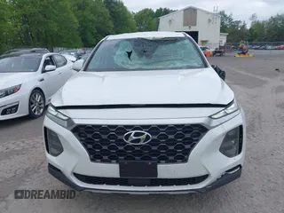 2019 Hyundai Santa Fe SE with VIN 5NMS2CAD9KH117777, listed as a IAAI auction lot 42296811 with 82,188 mi miles and . Bid and sale history available at DreamBid. Image 12.