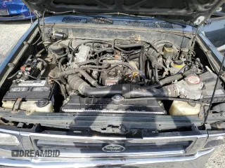 1993 Toyota Pickup DX z VIN JT4RN01P3P7060439, wystawiony jako Copart lot #57356125 z przebiegiem 259 773 mil mil oraz Szkoda całkowita • Salvage title. Historia ofert i sprzedaży dostępna na DreamBid. Obrazek 11.