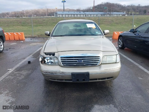 1999 Ford Crown Victoria LX with VIN 2FAFP74W0XX179512, listed as a IAAI auction lot 41124866 with 101,282 mi miles. Bid and sale history available at carsss.com. Image 12.