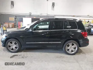 2015 Mercedes-Benz GLK with VIN WDCGG8JB0FG364079, listed as a IAAI auction lot 42096003 with 113,571 mi miles. Bid and sale history available at carsss.com. Image 14.