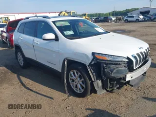 2014 Jeep Cherokee Latitude z VIN 1C4PJLCB6EW206891, wystawiony jako IAAI lot #42086193 z przebiegiem 130 548 mil mil oraz . Historia ofert i sprzedaży dostępna na DreamBid. Obrazek 1.