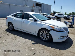 2013 Hyundai Azera with VIN KMHFG4JG4DA223002, listed as a Copart auction lot 54886085 with 164,125 mi miles and Clean Title. Bid and sale history available at carsss.com. Image 4.