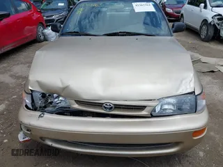 1997 Toyota Corolla with VIN 1NXBA02E7VZ544005, listed as a IAAI auction lot 42363262 with 200,537 mi miles and . Bid and sale history available at DreamBid. Image 12.
