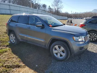 2012 Jeep Grand Cherokee Laredo with VIN 1C4RJFAG7CC299315, listed as a Copart auction lot 46174745 with 152,256 mi miles and Salvage Title. Bid and sale history available at carsss.com. Image 4.